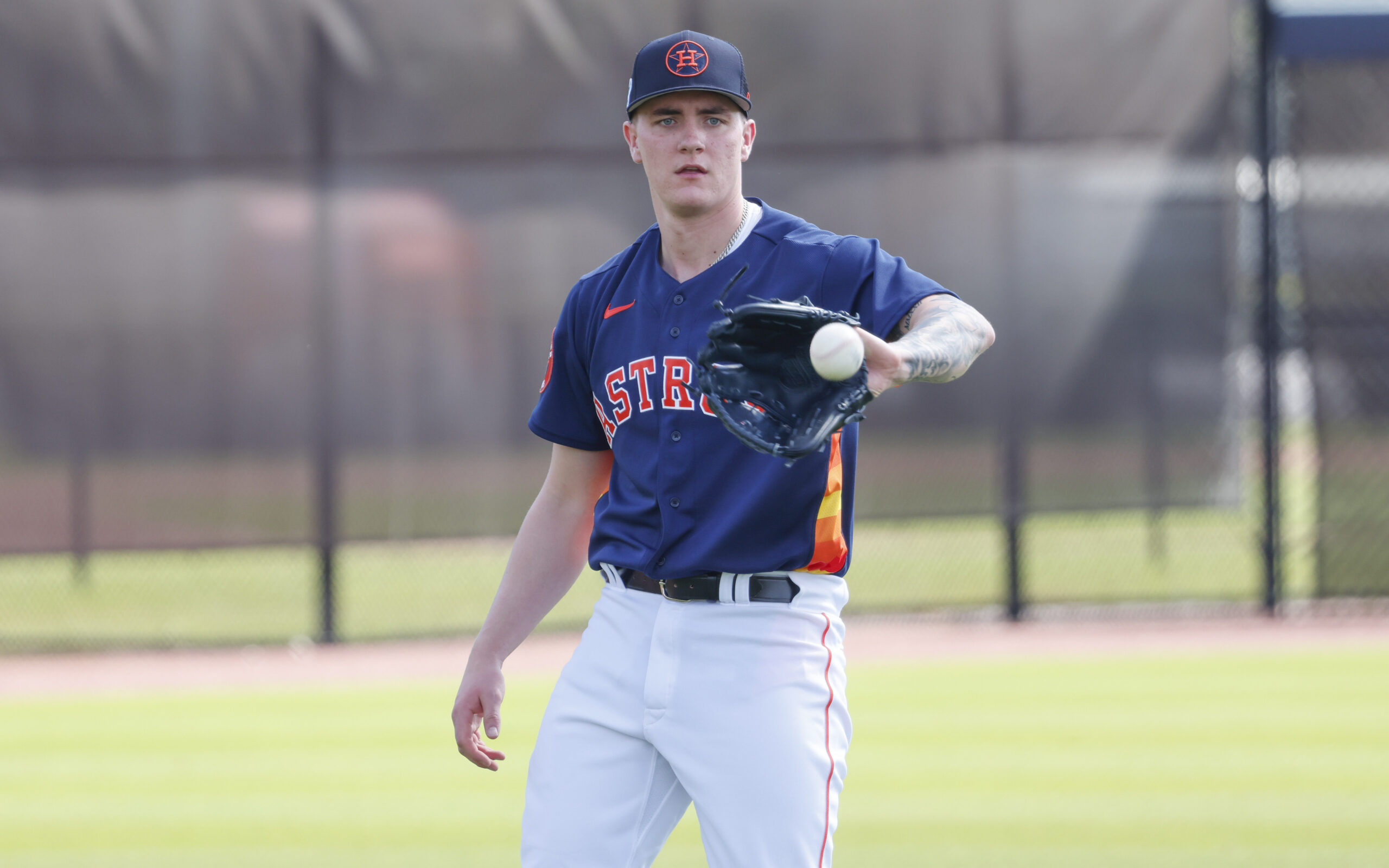 Feb 16, 2023; West Palm Beach, FL, USA; Houston Astros starting pitcher Hunter Brown (58) catches a ball during the Houston Astros spring training workouts at the Ballpark of the Palm Beaches.