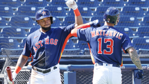 Feb 27, 2023; West Palm Beach, Florida, USA; Houston Astros right fielder Corey Julks (87) congratulates Houston Astros first baseman J.J. Matijevic (13) on scoring a run during the third inning against the Miami Marlins at The Ballpark of the Palm Beaches.