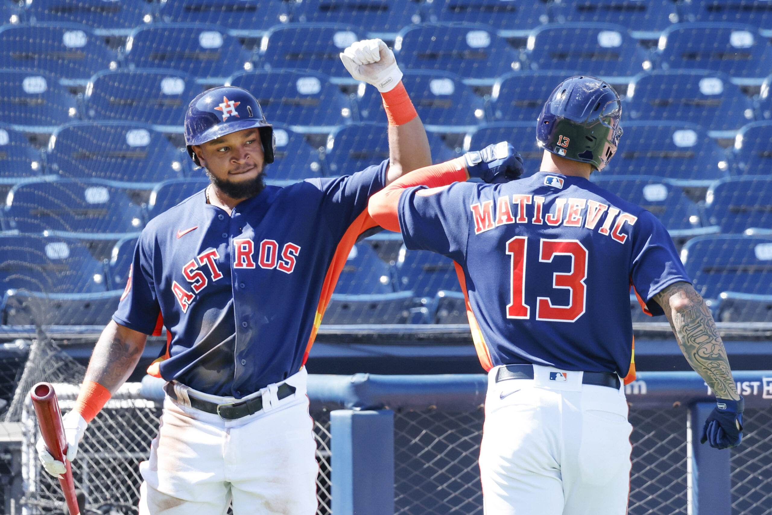Feb 27, 2023; West Palm Beach, Florida, USA; Houston Astros right fielder Corey Julks (87) congratulates Houston Astros first baseman J.J. Matijevic (13) on scoring a run during the third inning against the Miami Marlins at The Ballpark of the Palm Beaches.