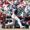 Mar 2, 2023; Jupiter, Florida, USA; Houston Astros third baseman Will Wagner (90) follows through on his ground rule double in the second inning against the St. Louis Cardinals at Roger Dean Stadium.