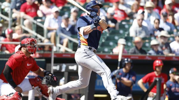 Mar 2, 2023; Jupiter, Florida, USA; Houston Astros third baseman Will Wagner (90) follows through on his ground rule double in the second inning against the St. Louis Cardinals at Roger Dean Stadium.