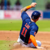 Mar 12, 2023; West Palm Beach, Florida, USA; Houston Astros catcher Korey Lee (11) attempts to slide into second base against the Miami Marlins during the third inning at The Ballpark of the Palm Beaches.