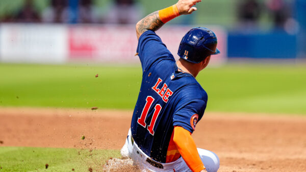 Mar 12, 2023; West Palm Beach, Florida, USA; Houston Astros catcher Korey Lee (11) attempts to slide into second base against the Miami Marlins during the third inning at The Ballpark of the Palm Beaches.